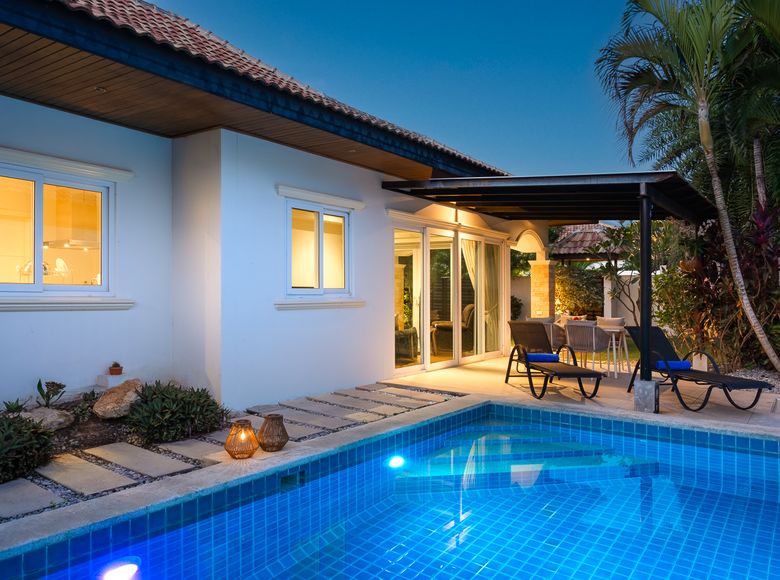 The pool glowing at dusk